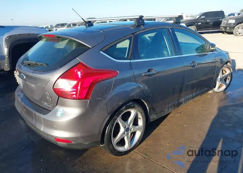 2013 Ford Focus Titanium z USA, uszkodzony, nr VIN 1FADP3N21DL177448